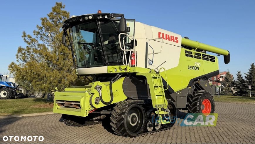 Claas Lexion 770 Terra Trac wyposażony w Header Vario 1230 12,27m - 1