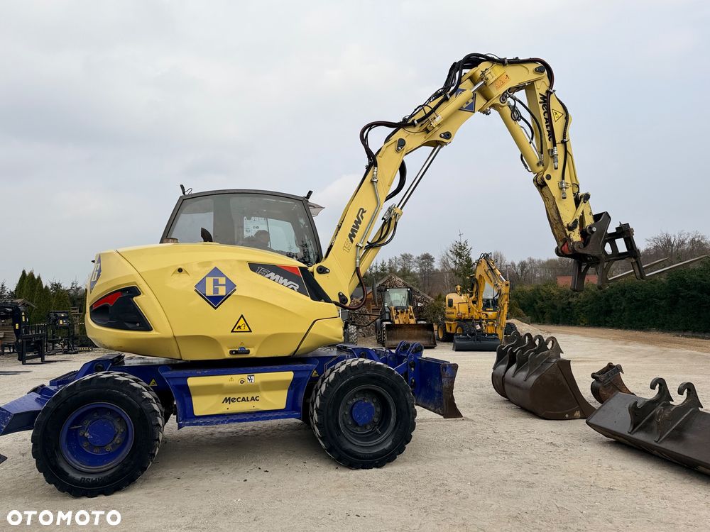 Mecalac Koparka 14 ton MECALAC 15 MWR koparko-ładowarka 3 łyżki widły 1 wł Centr.smarowanie Opony na BLIŹNIAKU 80%Camso ładowarka 714 12MTX 4x4 skrętne KLIMA kabina Premium silnik 146KM volvo EW140B DEUTZ szybka 35km/h - 30