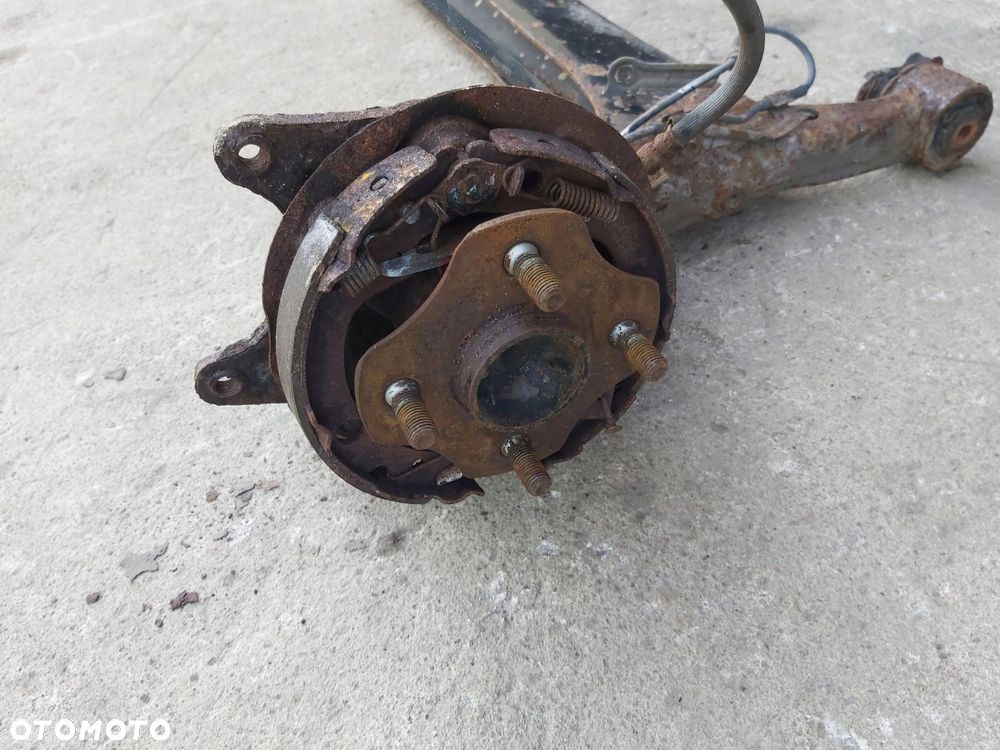 Toyota Yaris I belka zawieszenia tył bębny ABS pod TARCZE tarczobęben - 5