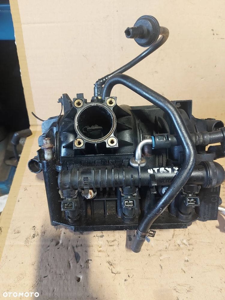 Kolektor ssący Opel Corsa C 1.0b '03r 09129713 - 6