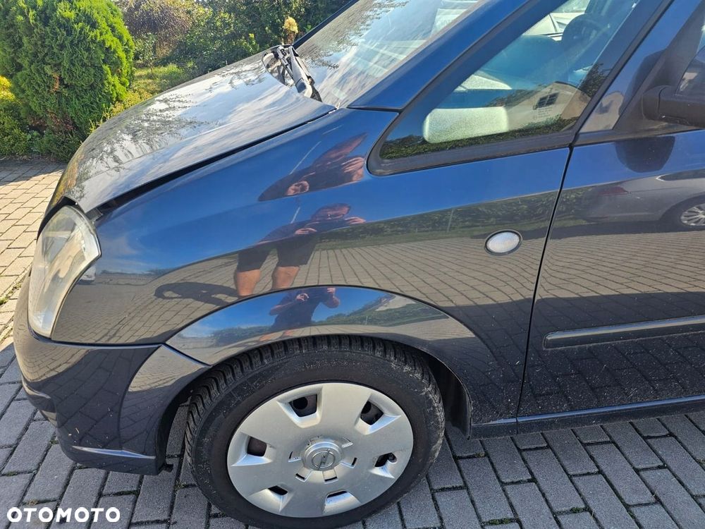 Błotnik lewy przód Opel Meriva A Z168