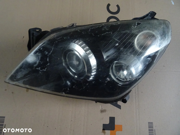 Lampa Astra H lewy przód Xenon