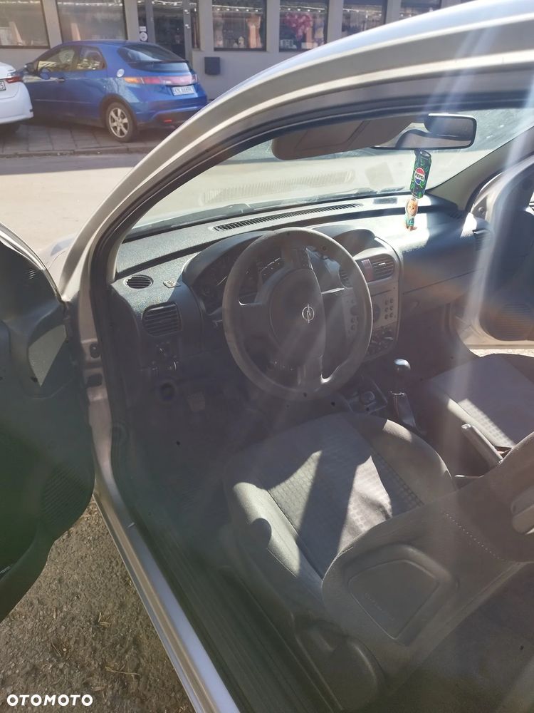 Opel Corsa 1.2 16V Cosmo - 12