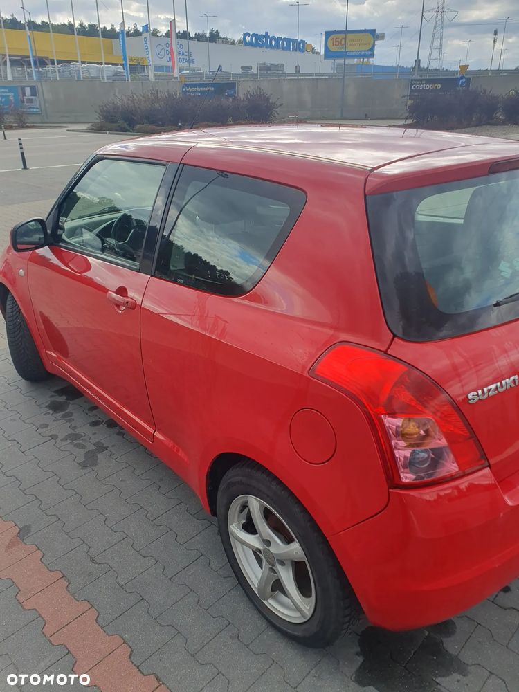 Suzuki Swift 1.3 Club - 12