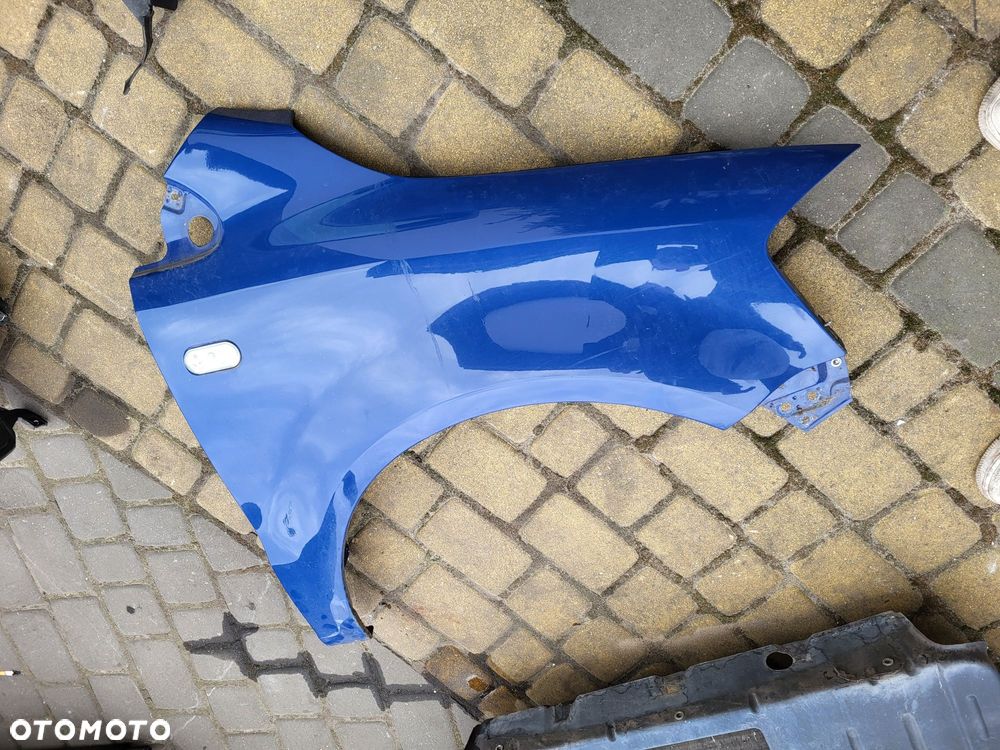 Błotnik przedni prawy vw fox 06r lakier ll5m