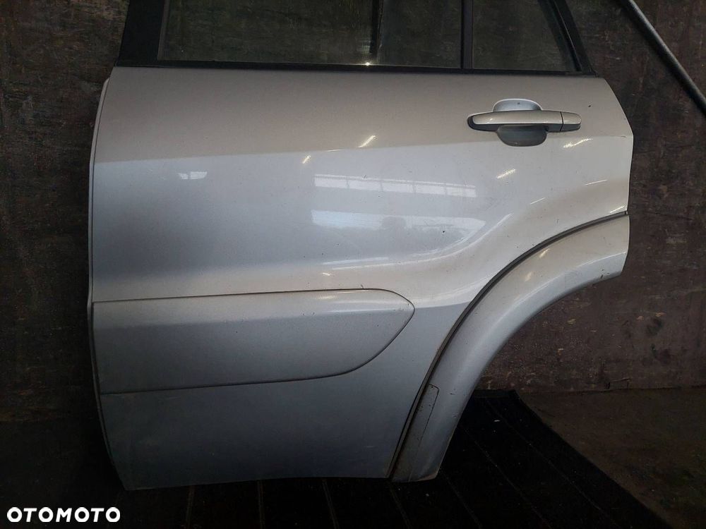 DRZWI KOMPLETNE LEWY TYŁ TOYOTA RAV4 II LIFT 1D4 5D - 6