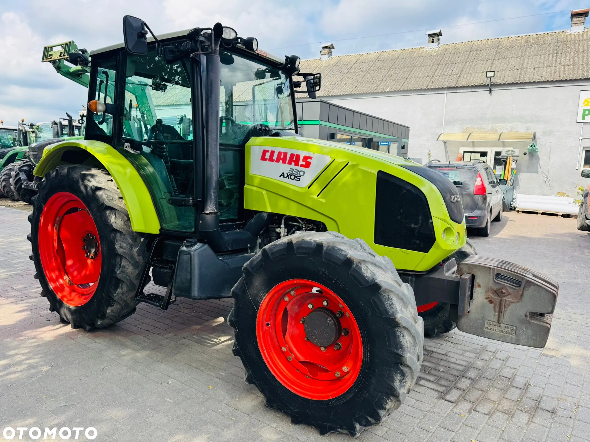 Claas Axos 330 - 10