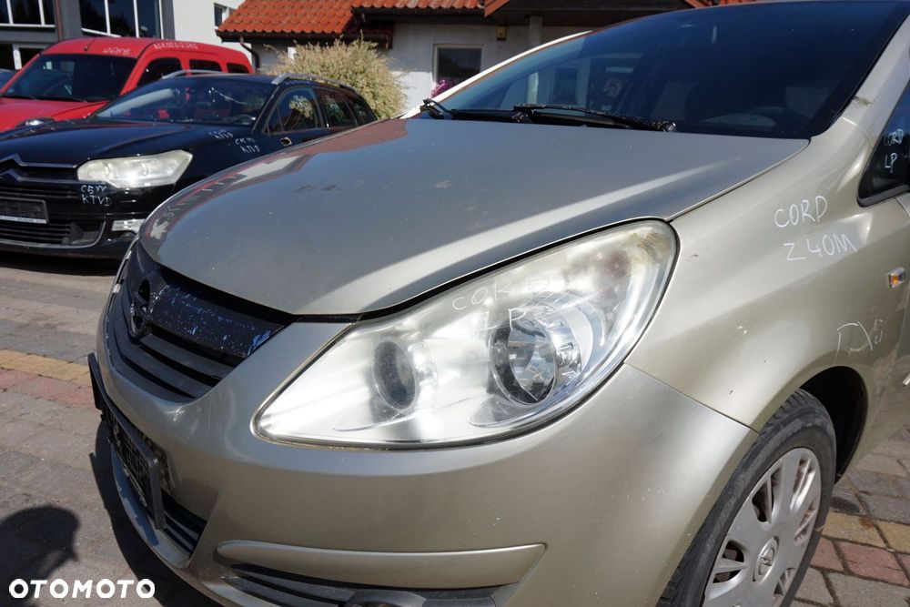 MASKA ZDERZAK BŁOTNIKI LAMPY CORSA D IV Z40M  OPEL 2006-2011 ZŁOTY PRZÓD KOMPLETNY - 31