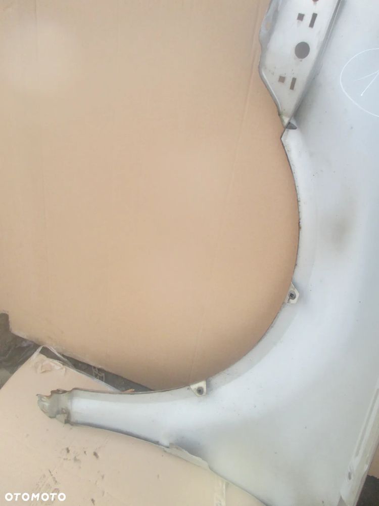 błotnik prawy VW Passat B5 FL Orginał bez rdzy - 10