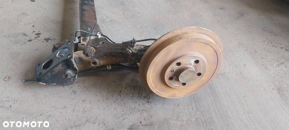 BELKA OŚ ZAWIESZENIA TYŁ BĘBNY Z ABS SKODA OCTAVIA I HB - 5
