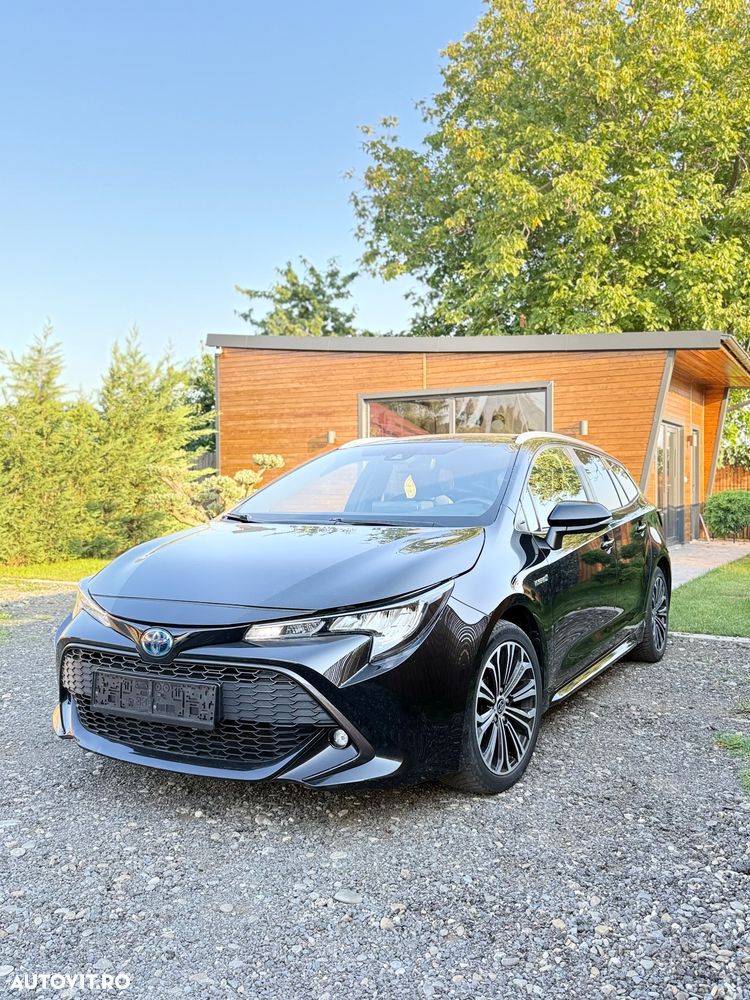 Toyota Corolla 1.8 HSD Business - 14