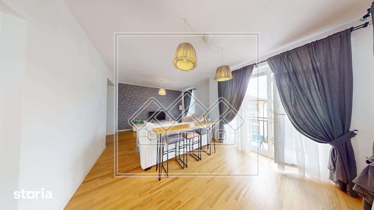 Apartament de vanzare – 3 camere, 77 mp, 2 bai, 2 balcoane si pod — fotografia 1