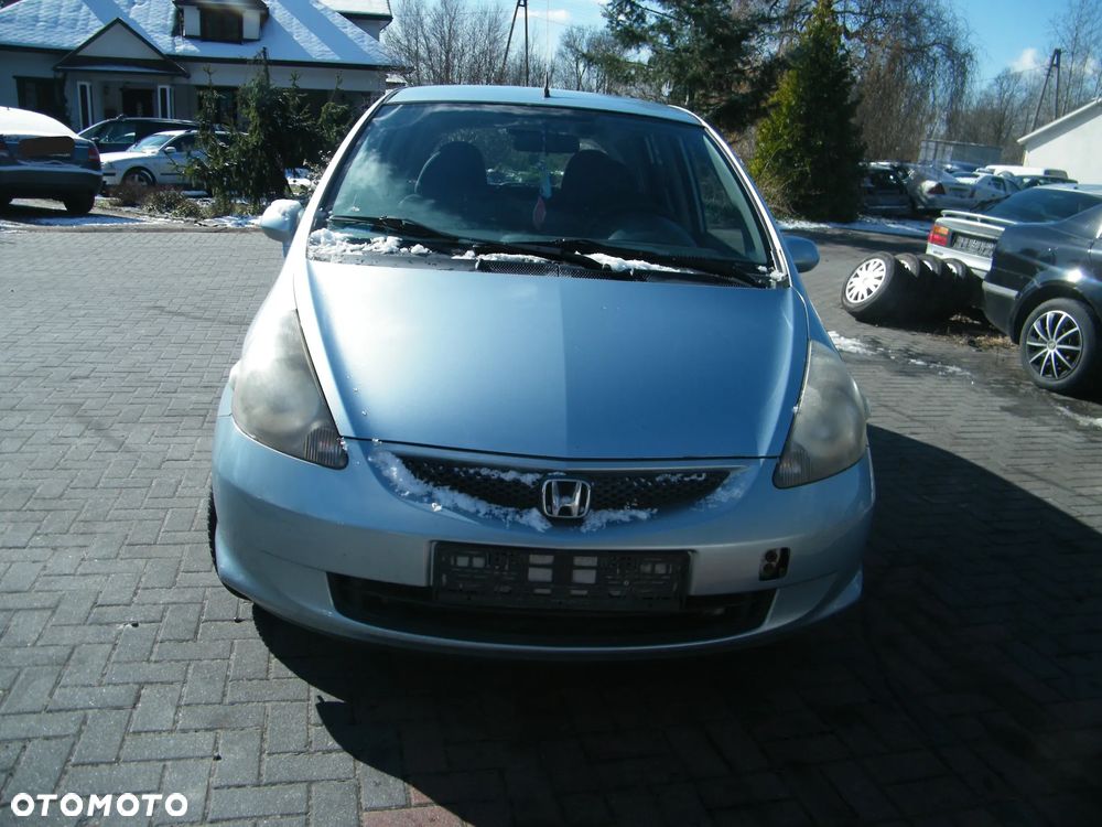 Honda Jazz II FL (04-08r.) 1.2 i-DSI 77KM. Silnik L12A4 Skrzynia SWLM lakier B528M. Cały na części. GWARANCJA !!!  Przód Tył Zestaw Komplet Drzwi Klapa Zderzak Błotnik Maska Grill Atrapa Szyba Pas Lampa Lusterko Boczki Fotel Kanapa Kokpit Deska Rozdzielcza Przełącznik Włącznik Sterownik Przewody Wiązka Instalacja Moduł Komputer Czujnik Listwa Pompa Alternator Wtryski Głowica Rozrusznik Kompresor Sprzęgło Dwumas Silnik Skrzynia ABS Klimatyzacji Paliwa Wspomagania Kolektor Turbina Przepustnica Zawór Chłodnica Koło Hak Belka Sanki Zawieszenie Mcpherson Półoś Amortyzator Wydech Tłumik Zacisk Most - 2