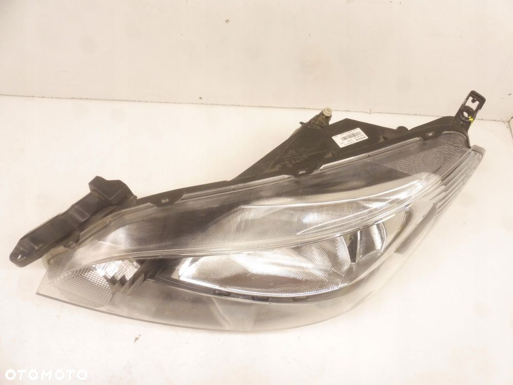 lampa lewa przód nissan nv200 oe 26060bj10a - 2