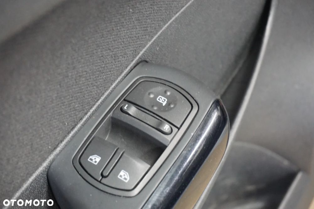 Opel Corsa 1.2 16V Enjoy - 22