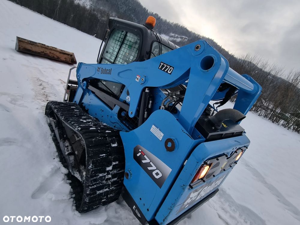 Bobcat T770 Ładowarka Gąsienicowa Udzwig 2,5 tony. Amerykańska potężna Ładowarka 2021rok  654mth z Norwegii! KLIMA! Potężna Moc silnik Turbodoładowany bobcat 100km! Widły łyżka. Linie Hydrauliczne dodatkowe. Aktualna DEKRA 2026r. Podzespoły gąsienice zero zużycia! Cała maszyna sterowana z dżojstika! - 32