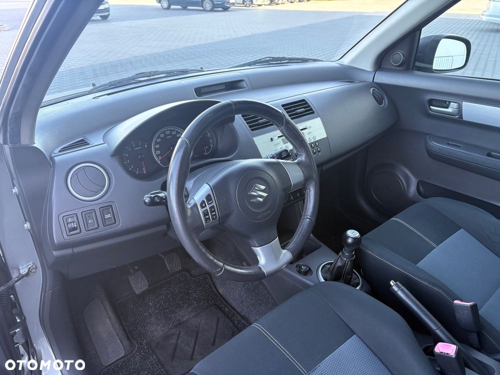 Suzuki Swift 1.3 Sakura - 11