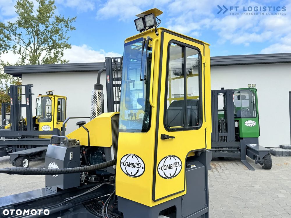 Combilift WÓZEK CZTEROKIERUNKOWY - WIELOKIERUNKOWY / C5000 / DIESEL / TRIPLEX 7600MM / WOLNY SKOK / POZYCJONER WIDEŁ / OGRZEWANIE / PEŁNA OGRZEWANA KABINA / STAN IDEALNY / Szeroka oferta wózków czterokierunkowych i bocznych, dopasowanych do różnorodnych potrzeb i zastosowań - 35