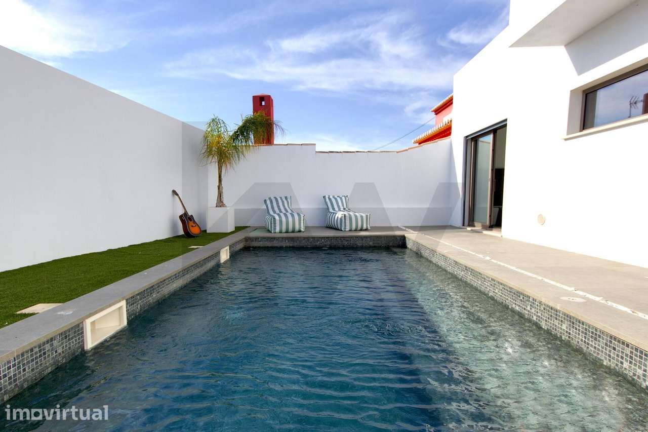 Onde o dia abranda: Moradia T4 nova com piscina em Lagos - Grande imagem: 4/40