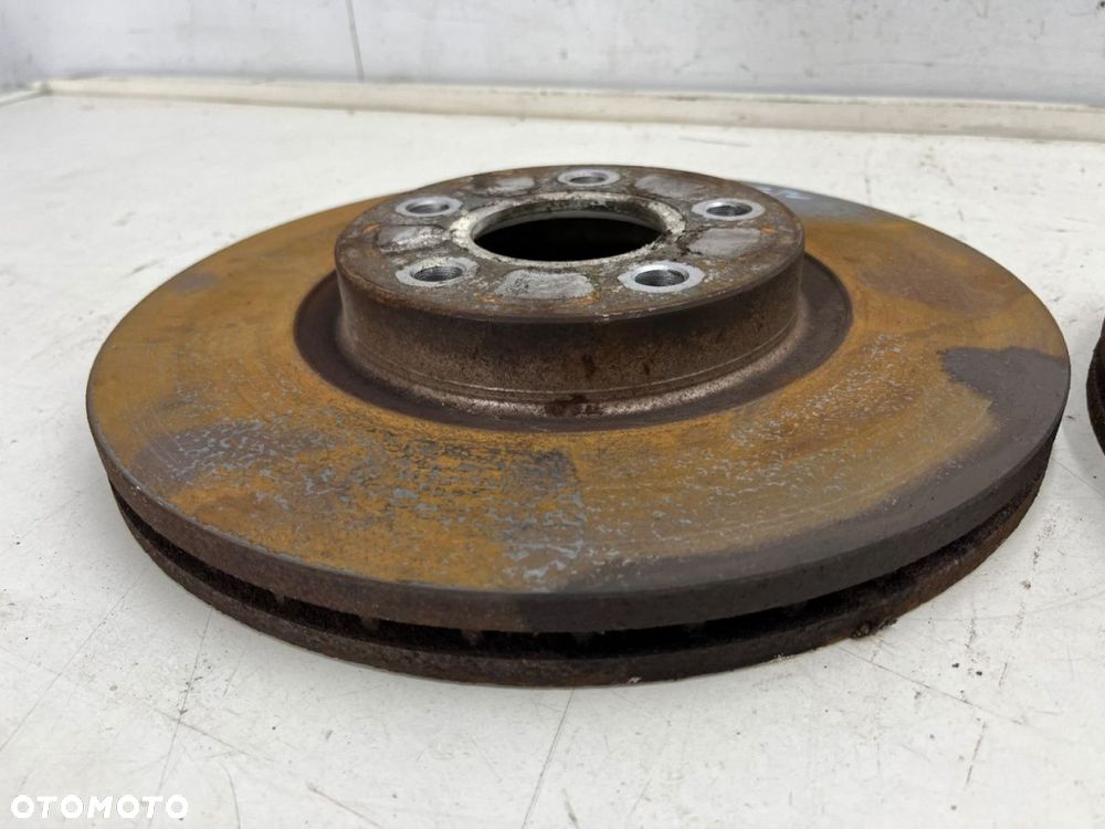 Tarcze hamulcowe Volvo C30 C70 S40 V40 V50 Ford C-max MK1 Focus MK2 Kuga 03-12r. przednie 300mm. KPL - 4