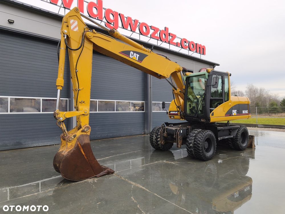 Caterpillar M316C - 3