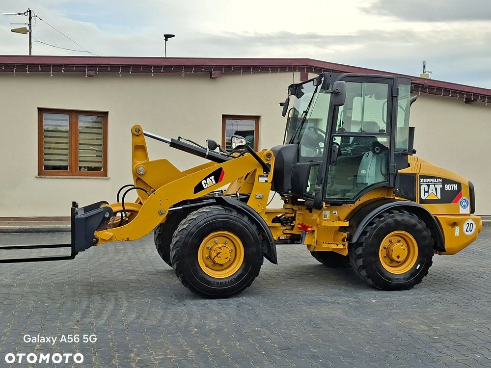 Caterpillar CAT 907H Łyżka+Widły - 1