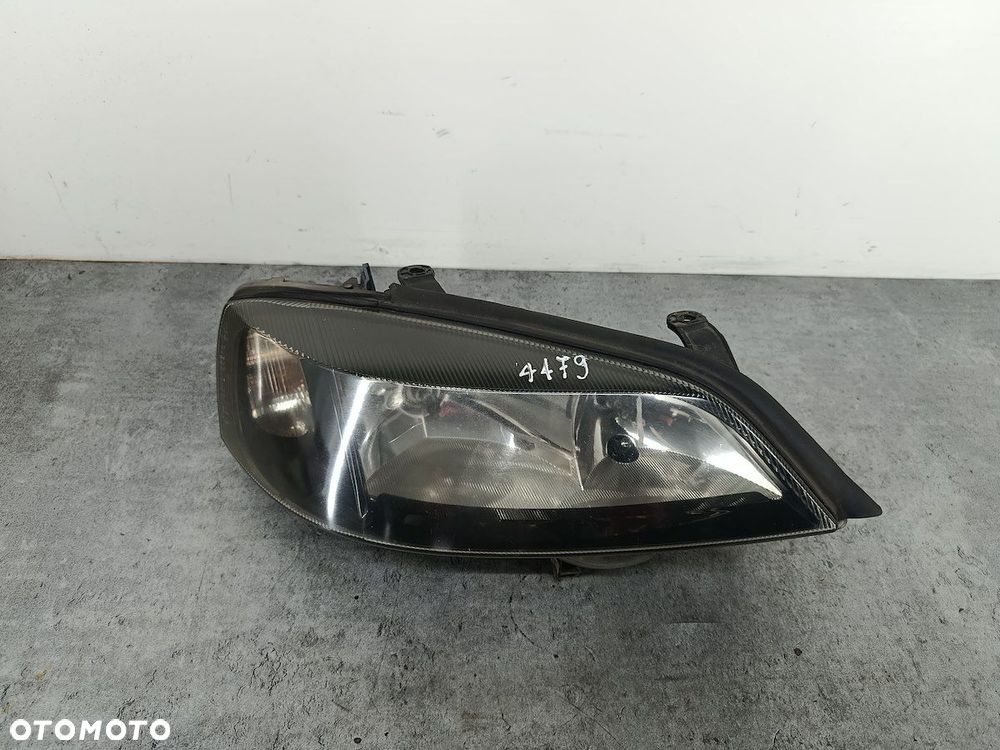 LAMPA PRZÓD PRAWA OPEL ASTRA G 093175724  1EG007640-58 - 1
