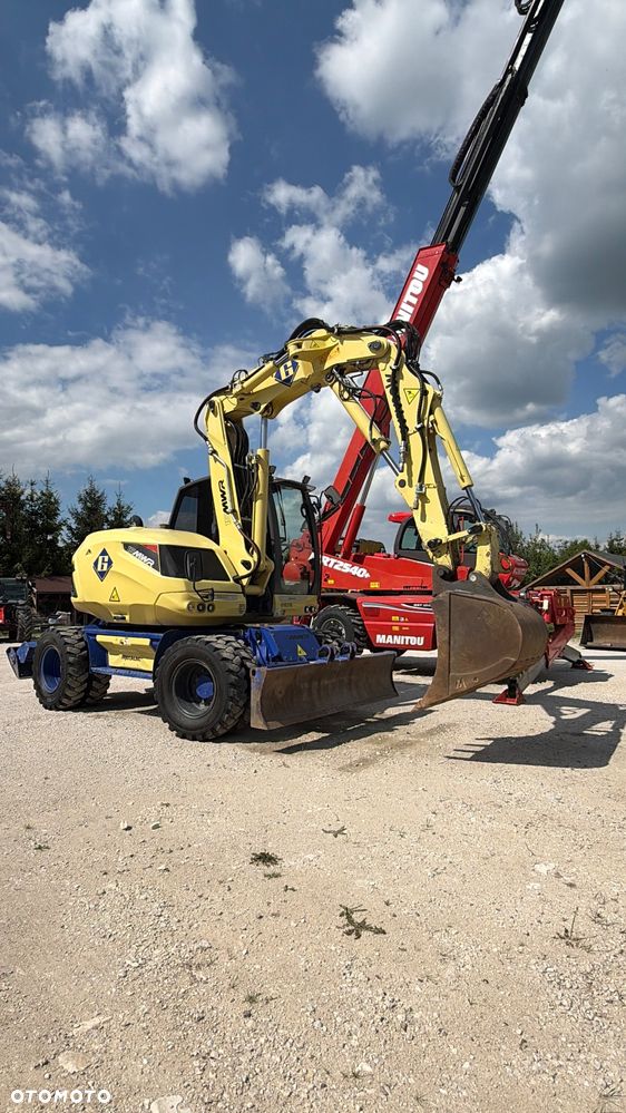 Mecalac Koparka 14 ton MECALAC 15 MWR koparko-ładowarka 3 łyżki widły 1 wł Centr.smarowanie Opony na BLIŹNIAKU 80%Camso ładowarka 714 12MTX 4x4 skrętne KLIMA kabina Premium silnik 146KM volvo EW140B DEUTZ szybka 35km/h - 3