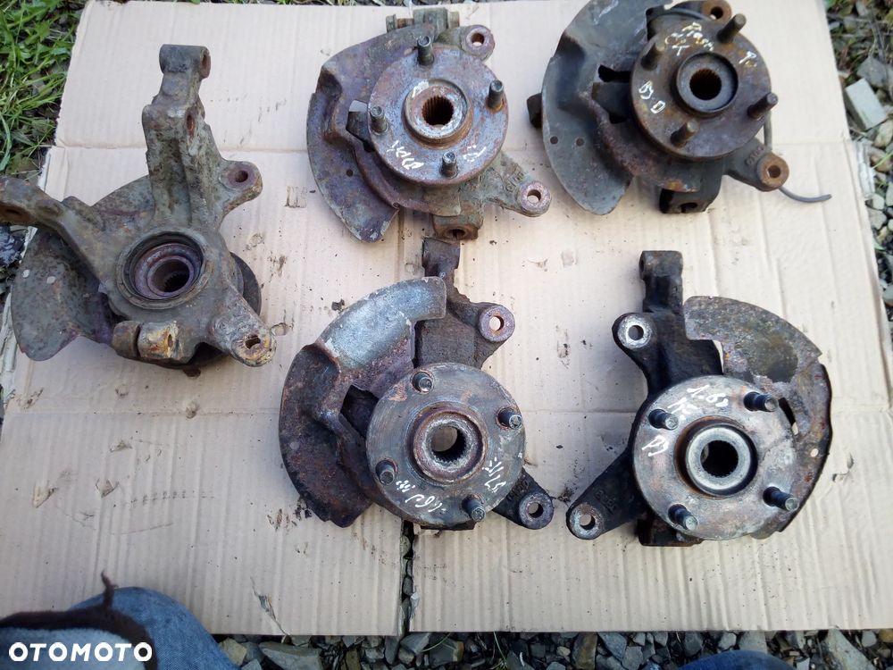 Mazda 323 323f bj 98-03  Zwrotnica piasta lewa prawa przód - 1