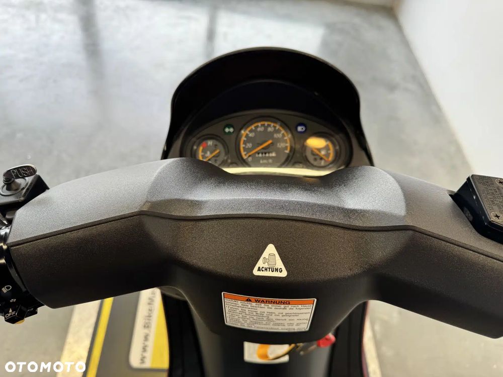 Suzuki Inny - 32