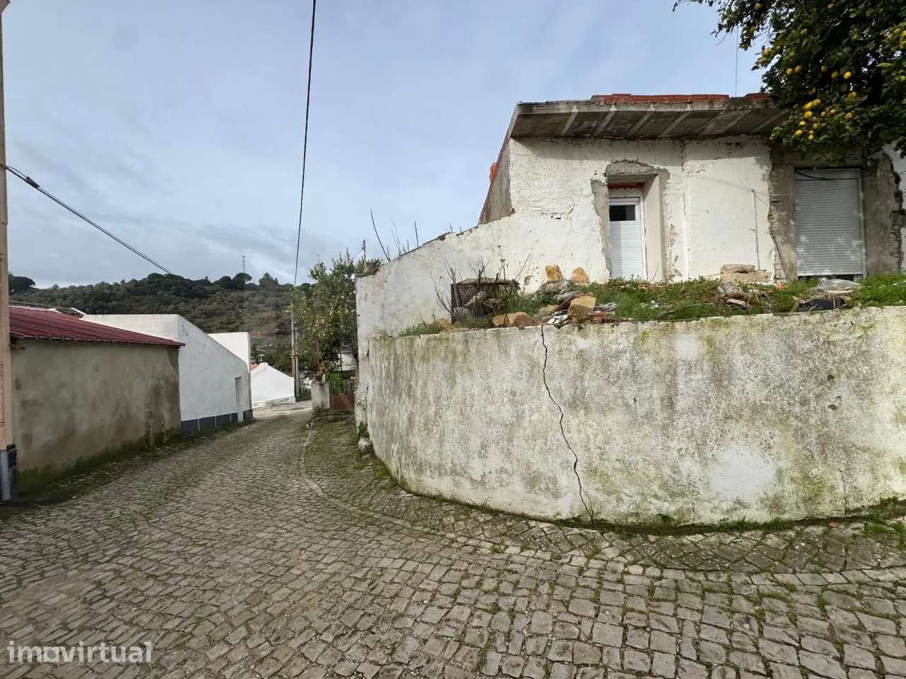 Oportunidade em Calhandriz: Moradia T2 Semi-Remodelada com Opção Ch... - Grande imagem: 2/13