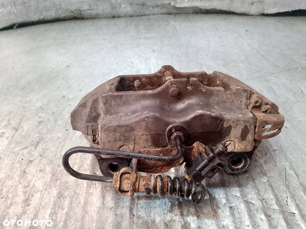 ZACISK HAMULCOWY LEWY TYŁ PORSCHE CAYENNE 3.2 V6 - 6