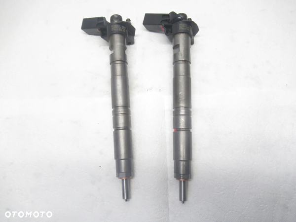 Wtryskiwacz VW Audi 2.0 TDI 0445116030 03L130277 0986435360