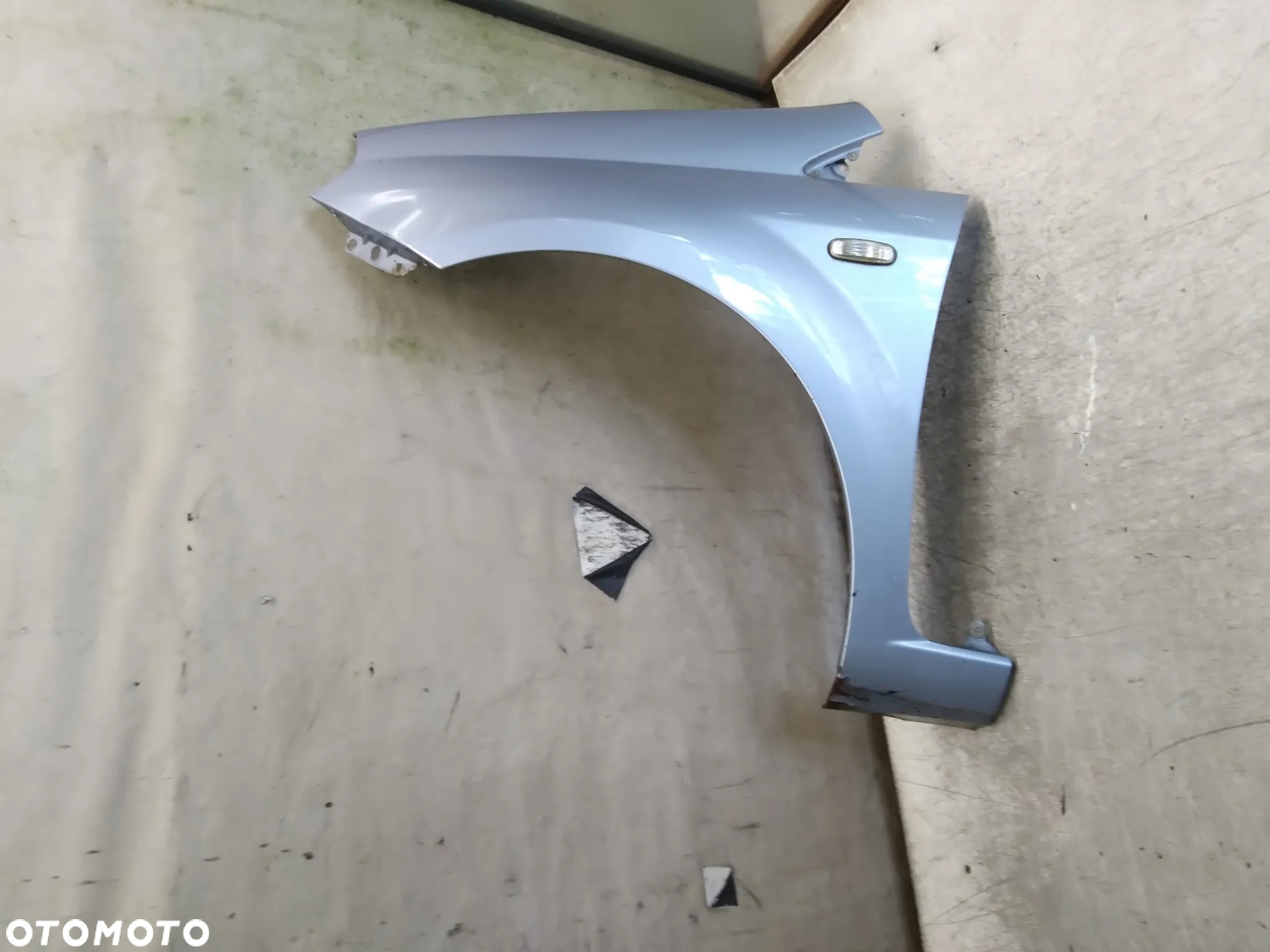 * BŁOTNIK PRZÓD PRZEDNI LEWY FIAT GRANDE PUNTO 457B BŁĘKITNY - 2