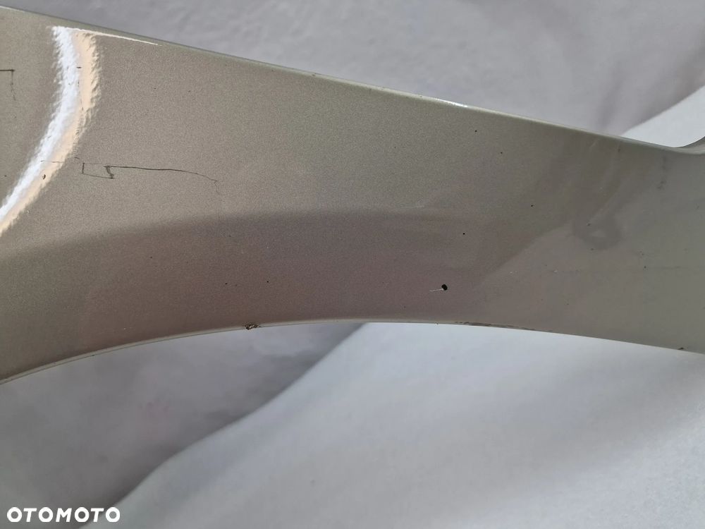 TOYOTA YARIS II LIFT 09-11 LEWY ŁADNY BŁOTNIK PRZEDNI PRZÓD , BEŻOWY METALIK , NR AUKCJI BŁ57 - 3