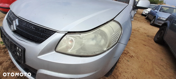 SUZUKI SX4 LAMPA LEWY PRAWY PRZÓD PRZEDNIA LEWA PRAWA nr. 18/9