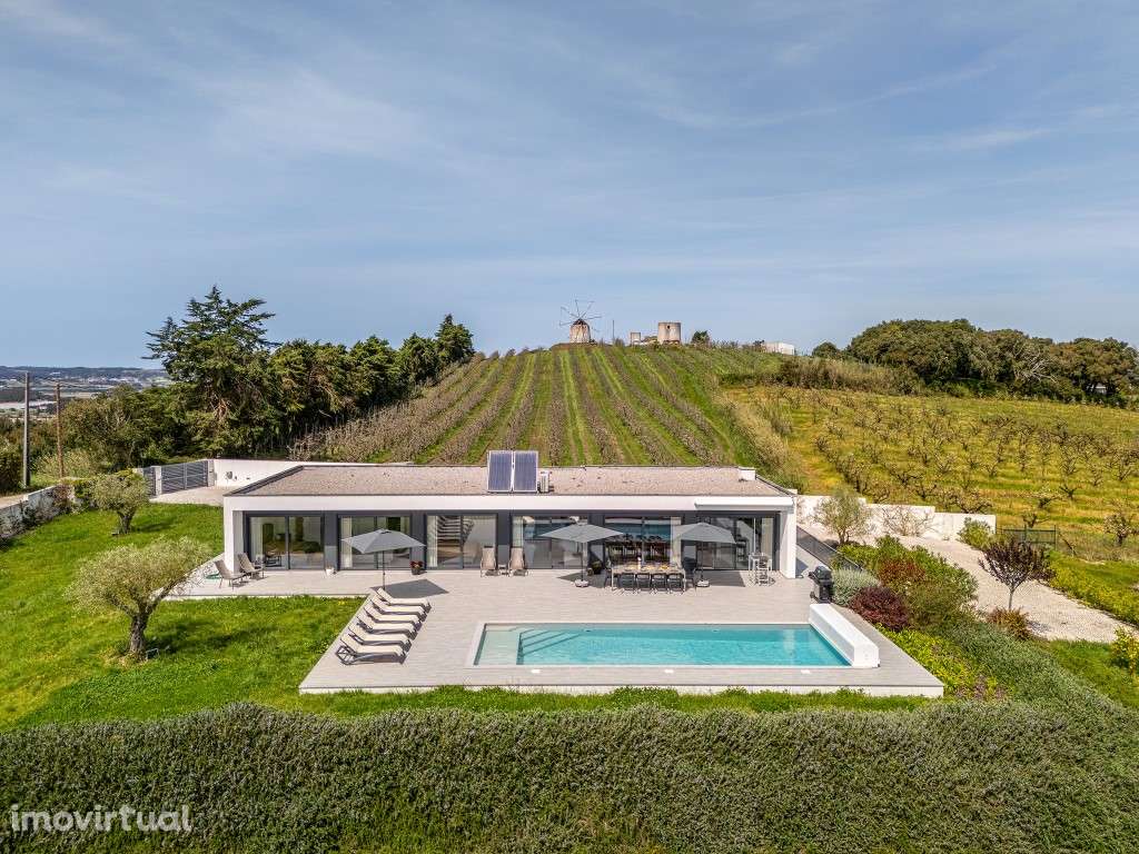 Moradia de luxo rodeada pela natureza inserida em 6920m² de terreno - Grande imagem: 2/60