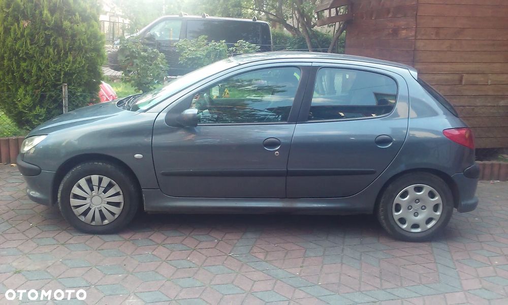 Peugeot 206 1.4 HDi Happy ABS - 1