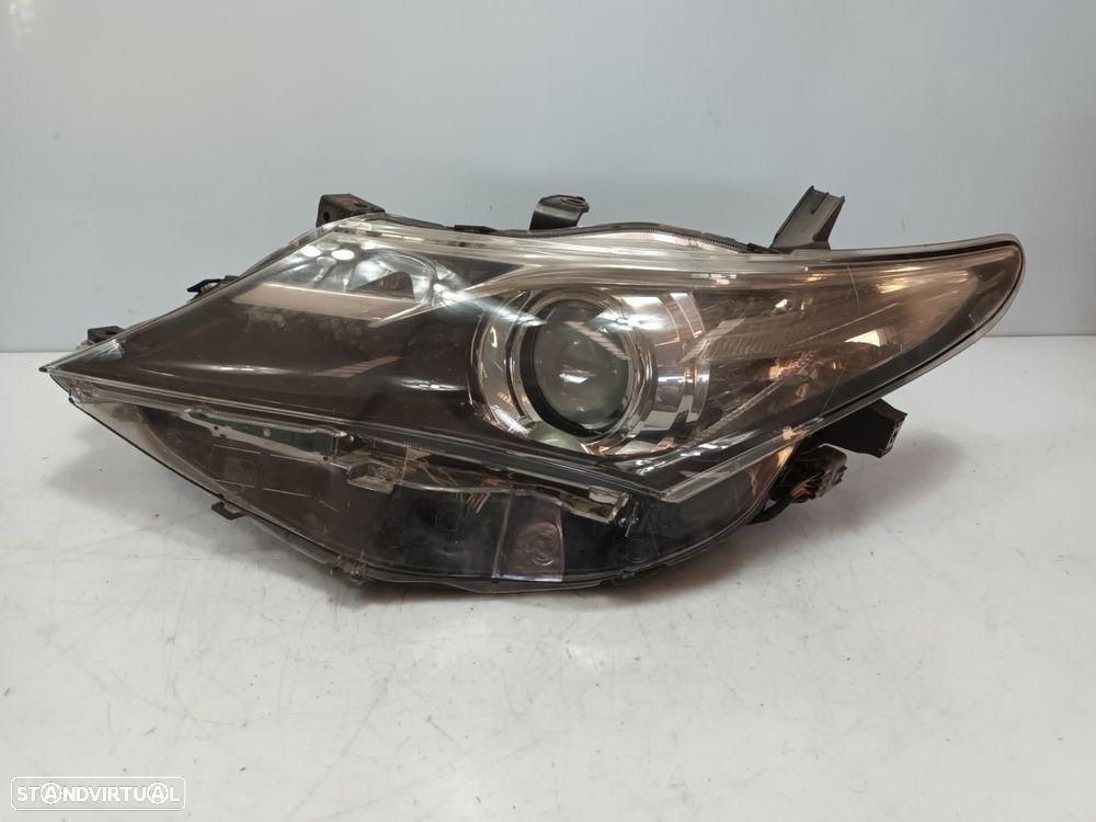 FAROL ESQUERDO TOYOTA AURIS TOURING SPORTS E18 - 1