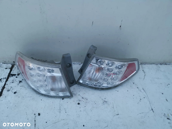 LAMPA TYŁ SUBARU IMPREZA 3 GH W BŁOTNIK LEWA PRAWA