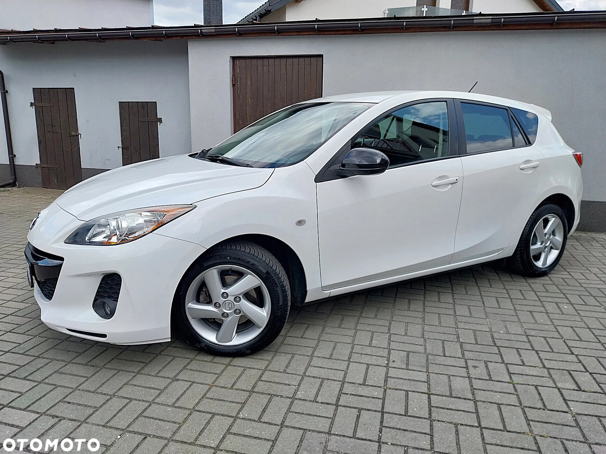 Mazda 3 1.6 Exclusive + - 2