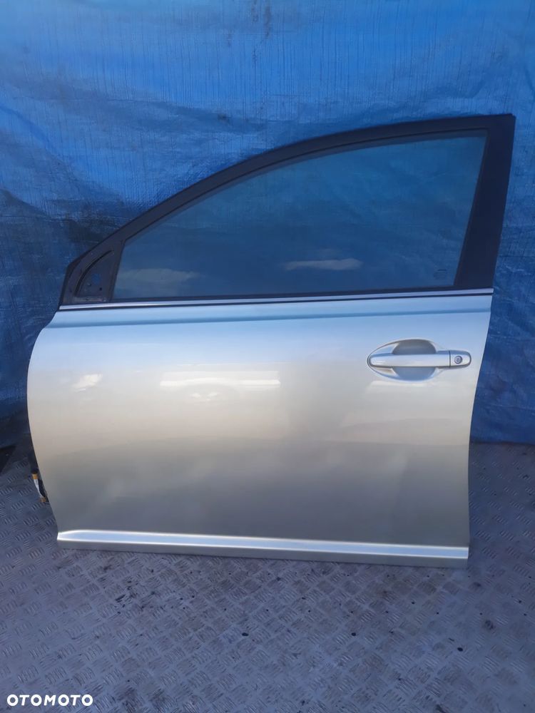 DRZWI LEWY PRZÓD TOYOTA AVENSIS II T25 LIFT 2007r  KOLOR: 1C0 - 2