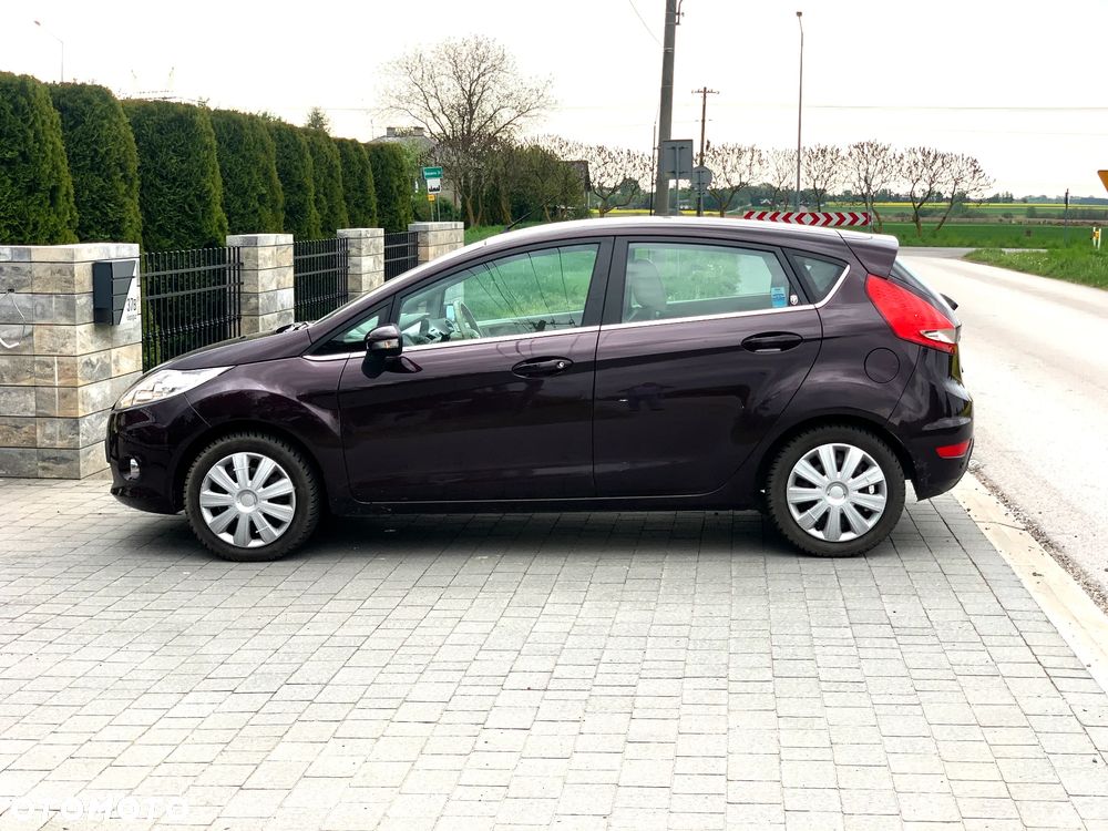 Ford Fiesta 1.4 Ghia - 8