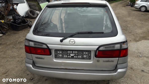 Mazda 626 GW 97-02 KOMBI Zderzak tylny tył pas hak szyba drzwi w kolor 22V