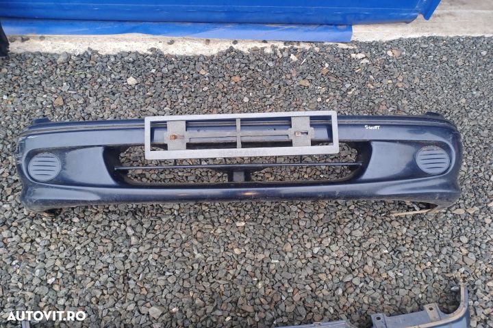 Bara fata Suzuki Swift 2 (facelift)  [din 1996 pana  2004] seria Hatchback 3-usi 1.0 AT (53 hp) - 1