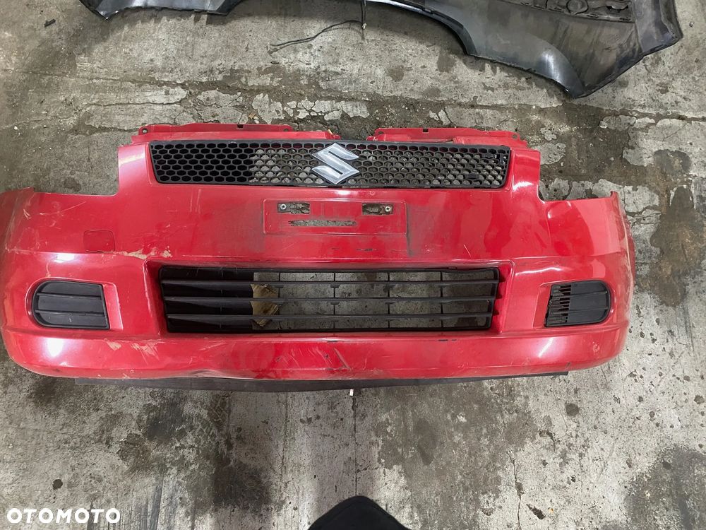 SUZUKI SWIFT ZDERZAK PRZÓD - 1