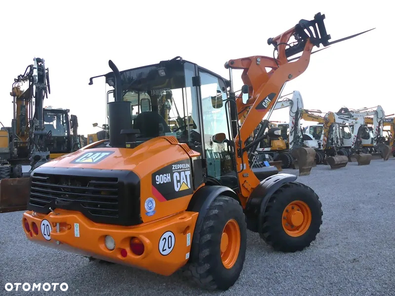 Caterpillar CAT 906H / Z Niemiec / 6424mtg / - 36