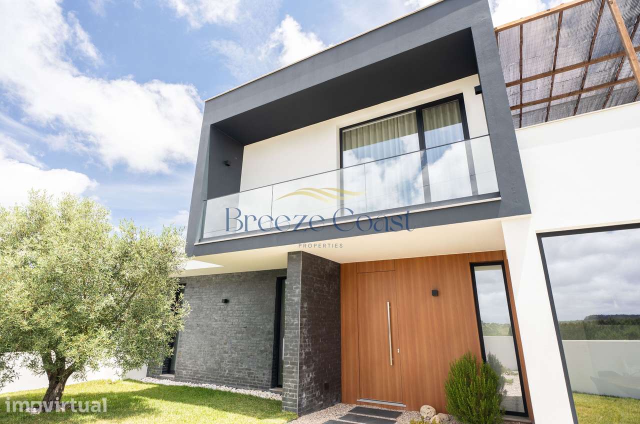 Moradia T4 de Arquitetura Distinta e Elegância Intemporal - Grande imagem: 4/37