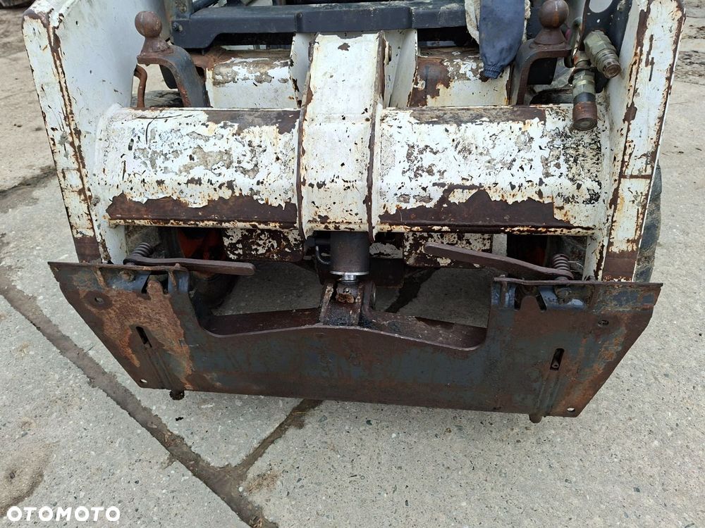 Bobcat 553 4X4 + Melroe Ingersoll-Rand 725S B/H - 10