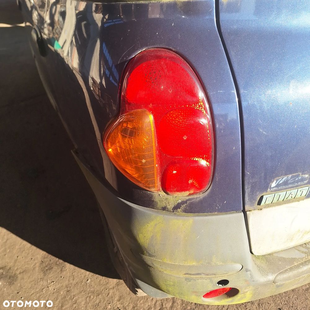 MASKA ZDERZAK DRZWI BLOTNIK LAMPY SZYBA CZESCI MULTIPLA 339/7 - 1